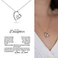  a close-up image of a woman wearing a heart-shaped pendant necklace with a touching father-daughter message.