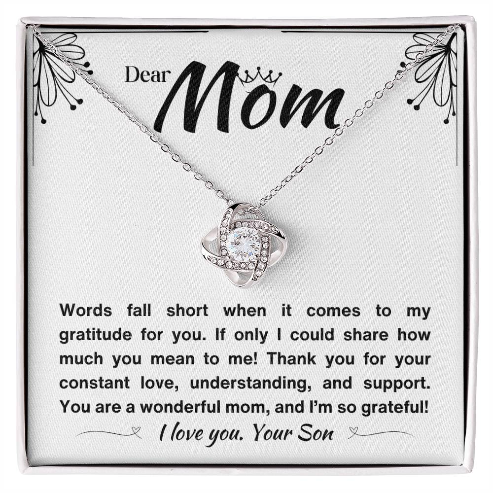 Silver necklace with a knot pendant and a heartfelt message to a mom.