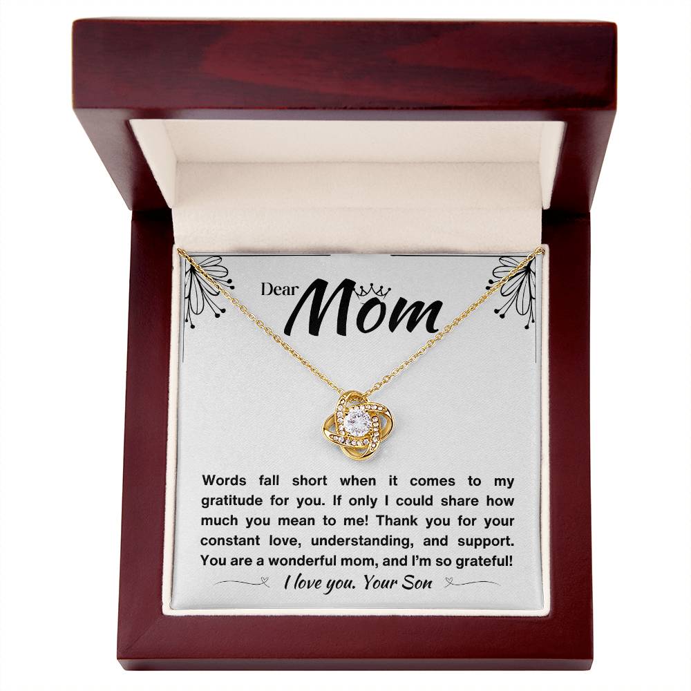 A luxury Gift box with a Love knot pendant and a message of gratitude to a mom.