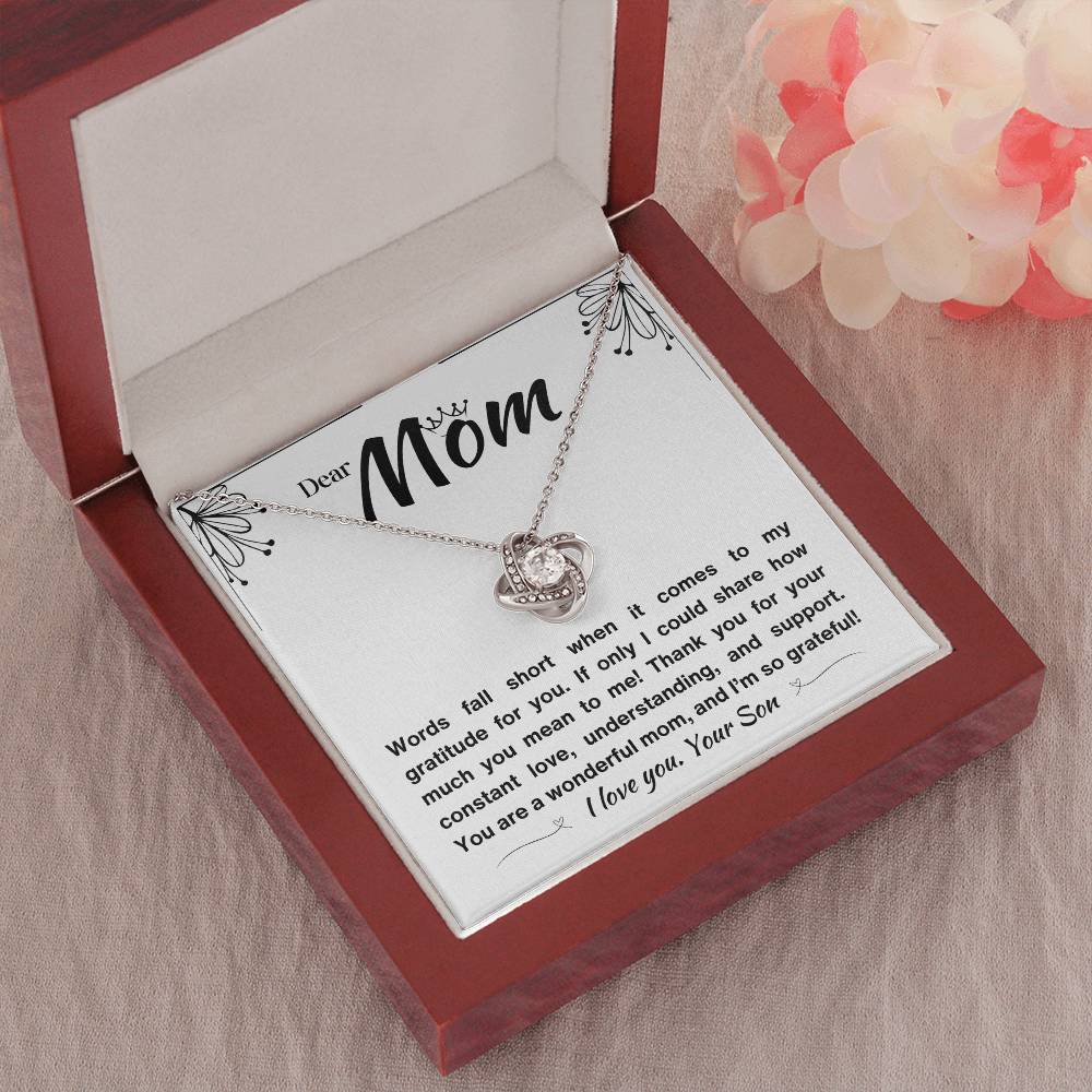 A token of love and appreciation: a silver knot necklace and a loving message for Mom.