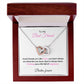 A necklace in a luxury gift box with a message to a best friend. The necklace features two interlocking hearts, one silver and one rose gold. The message on the box reads: "To My Best Friend, Good Friends are Like Stars, you don't always see them but you know they're always there. Wishing you a life full of happiness. Besties forever."