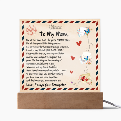Thoughtful gift for Mom—a vintage airmail-themed plaque with a loving message, butterflies, and a wooden LED base.