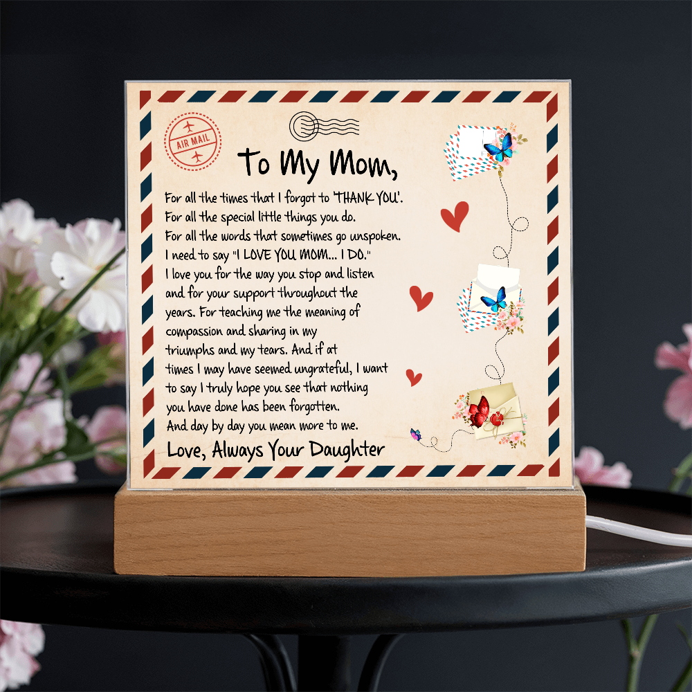 Beautiful Mother's Day plaque with a nostalgic airmail design, featuring a loving message, butterflies, and a wooden stand.