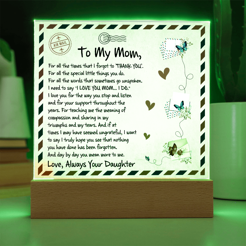 Acrylic plaque with a heartfelt letter to Mom, decorated with butterflies, hearts, and a floral touch 