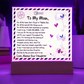 Mother's Day message on a decorative plaque with butterflies, hearts, and a warm wooden LED base.